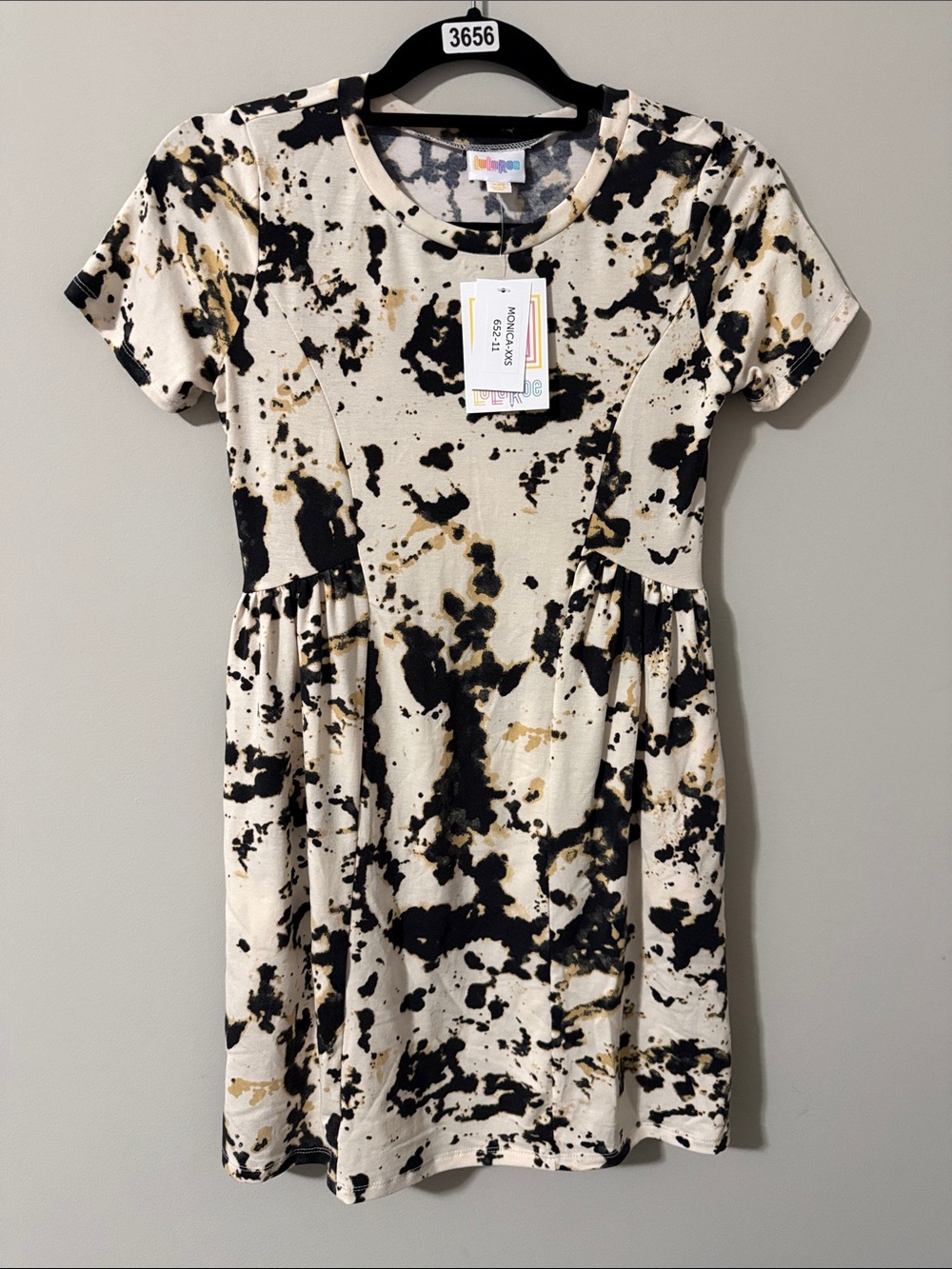 LuLaRoe Cream, Black & Gold Splatter Mini Dress